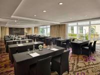 a conference room with black tables and black chairs at Hotel de l'Opera Hanoi - MGallery in Hanoi