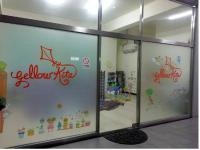 a store window with the words yellowknife on it at Yellow Kite Hostel in Tainan