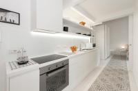 A kitchen or kitchenette at Vatican White Domus