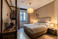 Casa Teva Lisboa Boutique Hotel by chic&basicにあるベッド