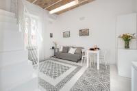 A seating area at Vatican White Domus