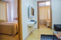 TV a/nebo společenská místnost v ubytování Airport Residence