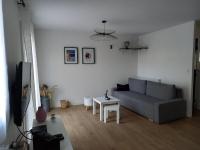 Televízia a/alebo spoločenská miestnosť v ubytovaní Une Parenthèse Enchantée