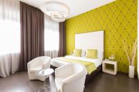Łóżko lub łóżka w pokoju w obiekcie Hotel Tiziano - Gruppo Mini Hotel