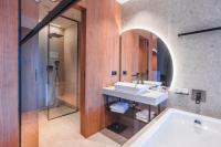 Koupelna v ubytování Magnetit Hotel Šumava