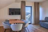 TV a/nebo společenská místnost v ubytování Magnetit Hotel Šumava