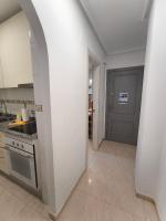 A kitchen or kitchenette at Cozy apartment in downtown area