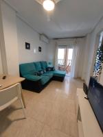 A seating area at Cozy apartment in downtown area