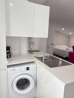 Kuchyň nebo kuchyňský kout v ubytování Apartamentos Carmela
