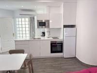 Kuchyň nebo kuchyňský kout v ubytování Apartamentos Carmela