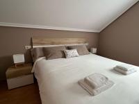 Postel nebo postele na pokoji v ubytování Villa San Perella