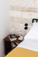 A bed or beds in a room at Casale Petrarolo