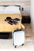 A bed or beds in a room at Casale Petrarolo