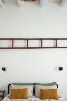 A bed or beds in a room at Casale Petrarolo