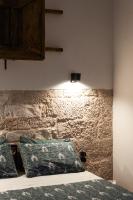 A bed or beds in a room at Casale Petrarolo