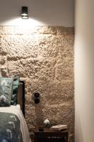 A bed or beds in a room at Casale Petrarolo