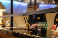 ホテル日航大分 オアシスタワーに飾ってある許可証、賞状、看板またはその他の書類