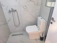Kúpeľňa v ubytovaní Vetti Rooms