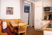 Kuchyň nebo kuchyňský kout v ubytování Appartement-Gästehaus Ursula