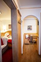 Postel nebo postele na pokoji v ubytování Appartement-Gästehaus Ursula