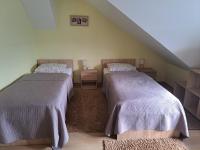 Posteľ alebo postele v izbe v ubytovaní Apartman EMA