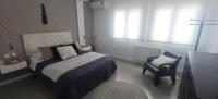 Postel nebo postele na pokoji v ubytování loft CARRASKETA