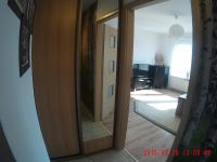 Televízia a/alebo spoločenská miestnosť v ubytovaní Apartament Masovia