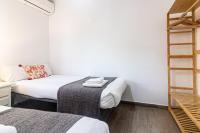 Postel nebo postele na pokoji v ubytování Malaga Center Flat Beach & Terrace