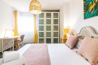 Postel nebo postele na pokoji v ubytování Malaga Center Flat Beach & Terrace