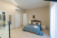 Ruins de charme B&B luxury Pompeiにあるベッド