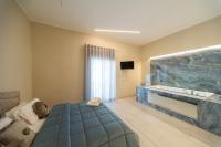 Ruins de charme B&B luxury Pompeiにあるベッド
