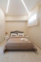 Ruins de charme B&B luxury Pompeiにあるベッド