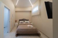 Ruins de charme B&B luxury Pompeiにあるベッド