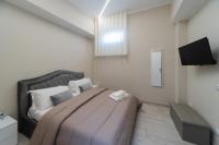Ruins de charme B&B luxury Pompeiにあるベッド