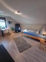 Postel nebo postele na pokoji v ubytování Ferienwohnung Saarschleife