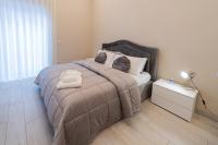 Ruins de charme B&B luxury Pompeiにあるベッド