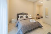 Ruins de charme B&B luxury Pompeiにあるベッド