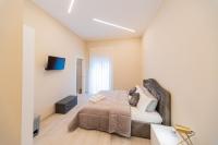 Ruins de charme B&B luxury Pompeiにあるテレビまたはエンターテインメントセンター