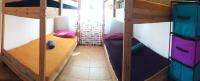 Poschodová posteľ alebo postele v izbe v ubytovaní Bhavana Surf House