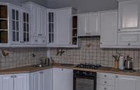 Kuchyňa alebo kuchynka v ubytovaní Velvet Apartament Kopińska
