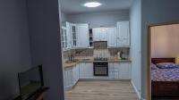 Kuchyňa alebo kuchynka v ubytovaní Velvet Apartament Kopińska