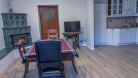 Televízia a/alebo spoločenská miestnosť v ubytovaní Velvet Apartament Kopińska