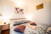 Posteľ alebo postele v izbe v ubytovaní M & J Central Suites
