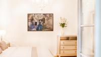 Postel nebo postele na pokoji v ubytování Milford Suites Budapest