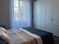 Posteľ alebo postele v izbe v ubytovaní Appartamento Invrea