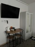 Televízia a/alebo spoločenská miestnosť v ubytovaní LuxRooms - Hotel type with private jacuzzi