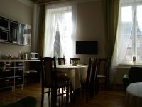 Televízia a/alebo spoločenská miestnosť v ubytovaní Apartment Irene