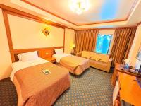 Postel nebo postele na pokoji v ubytování Taksilahotel