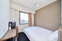 Washington R&B Hotel Hakata Ekimae 2にあるベッド