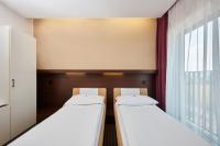 Postel nebo postele na pokoji v ubytování Hotel Rottal